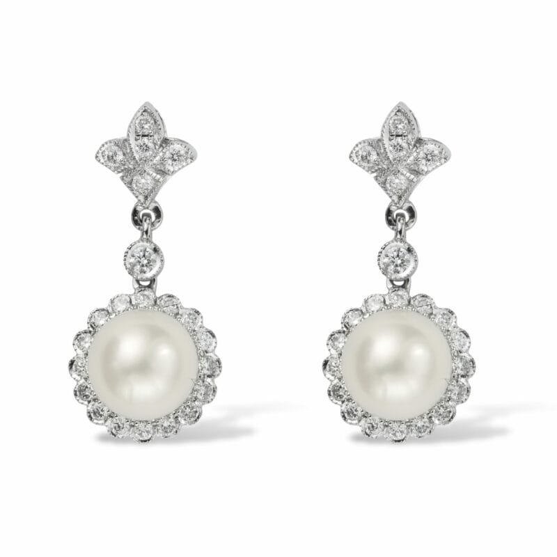 A Pair Of Pearl And Diamond Cluster Drop Earrings
