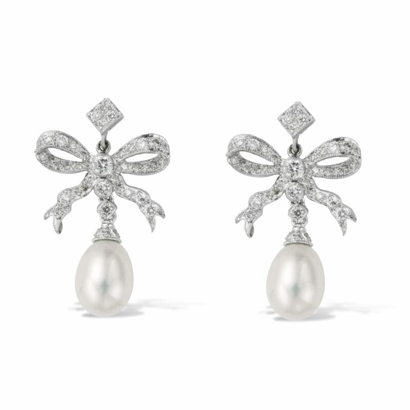A Pair Of Cultured Pearl And Diamond Bow Earrings