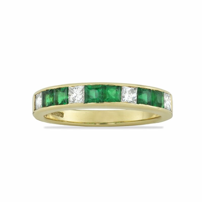 An Emerald And Diamond Half Eternity Ring