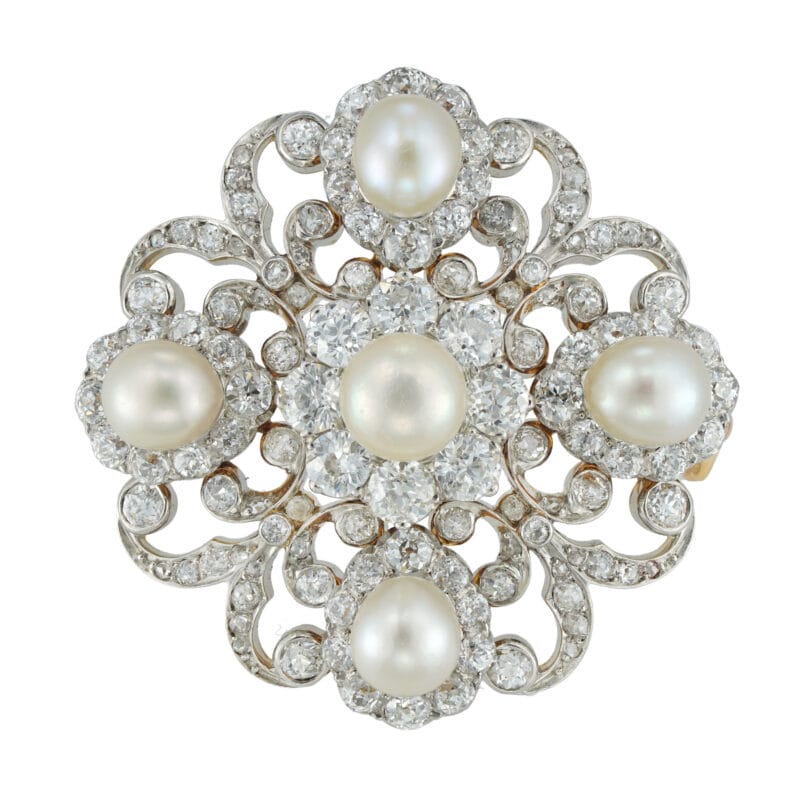 A Victorian Diamond And Pearl Scroll Brooch