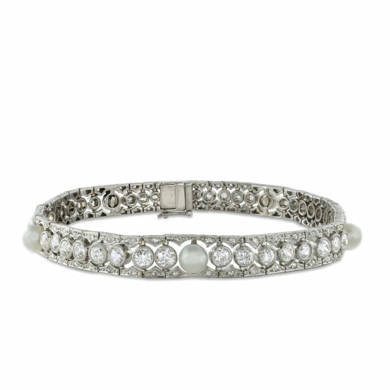 An Edwardian Diamond And Pearl Bracelet By Skinner & Co