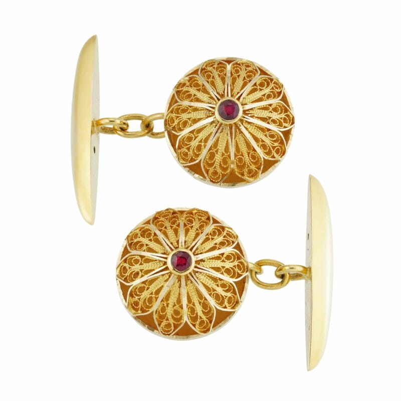A pair of button-shape filigree gold cufflinks