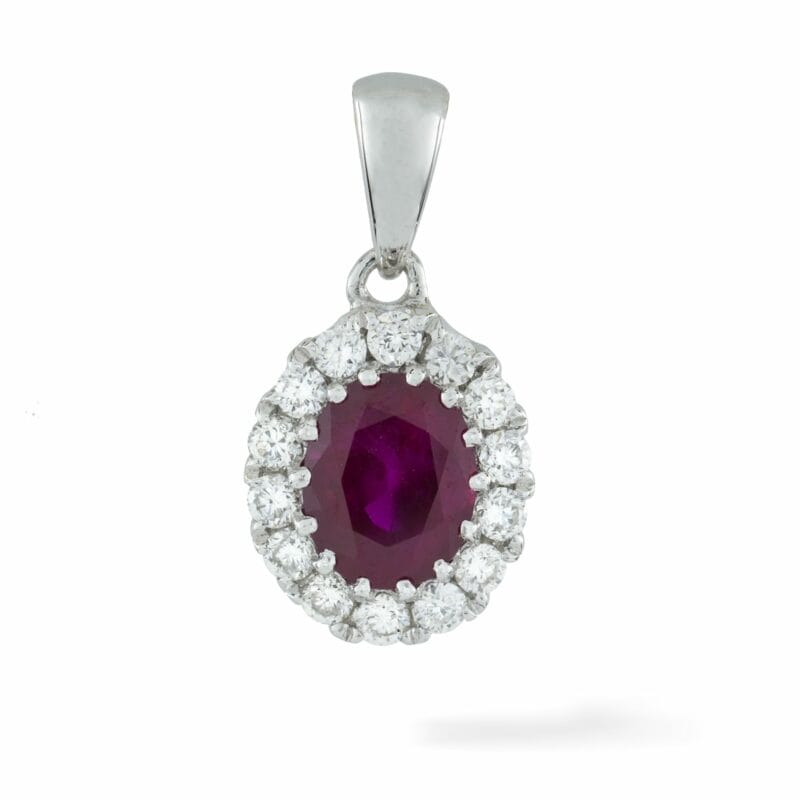 An Oval Ruby And Diamond Cluster Pendant