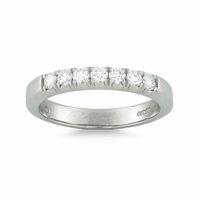 A Platinum Seven Stone Diamond Half Eternity Ring