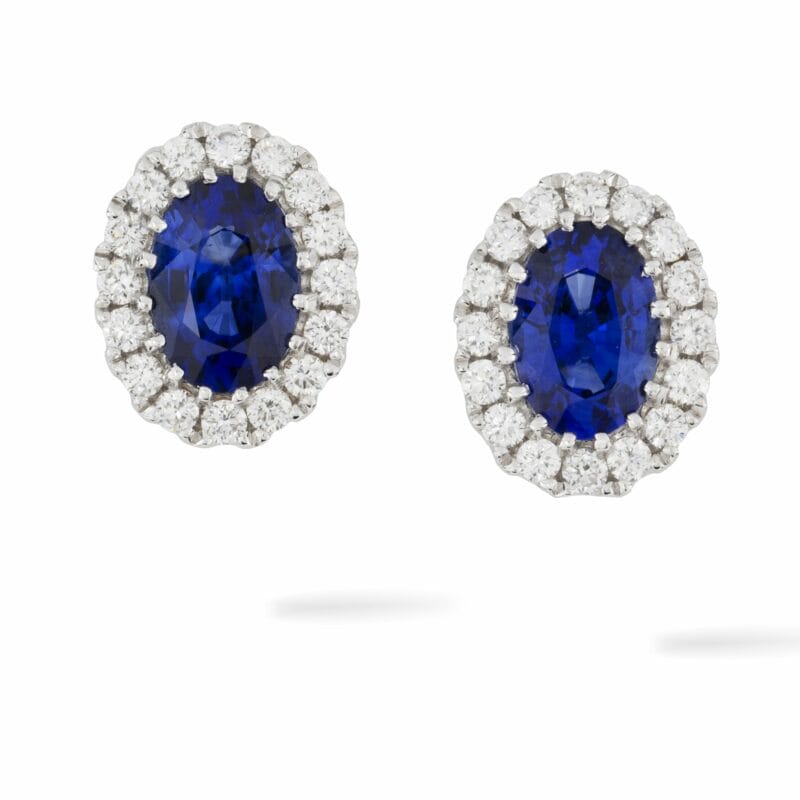 A Pair Of Sapphire And Diamond Cluster Earrings