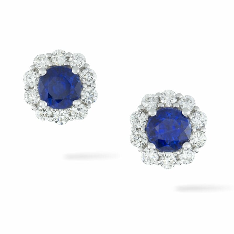 A Pair Of Sapphire And Diamond Cluster Earrings