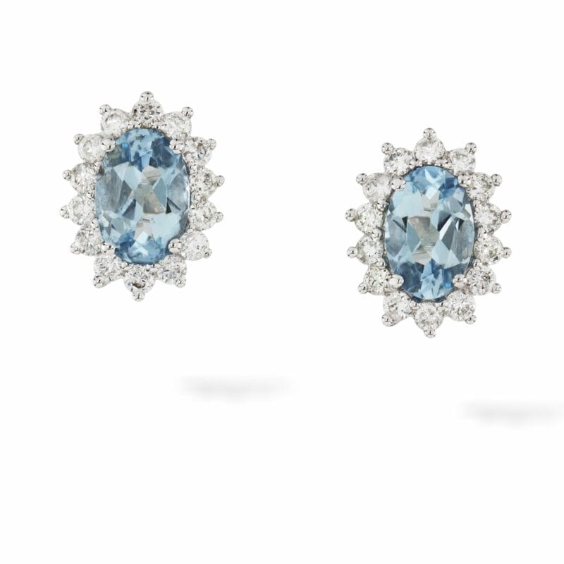 A Pair Of Aquamarine And Diamond Cluster Earrings