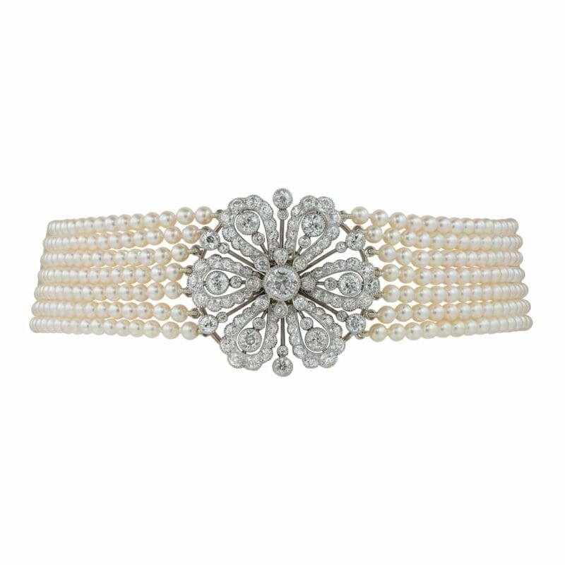 An early 20th century diamond and cultured pearl necklace