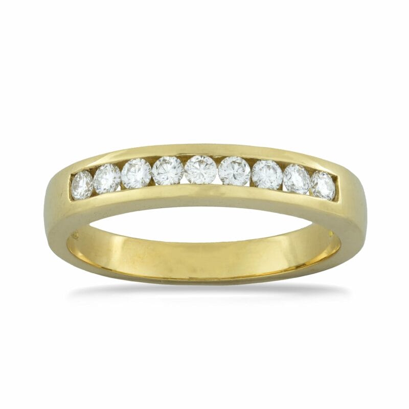 A Yellow Gold Half Eternity Ring