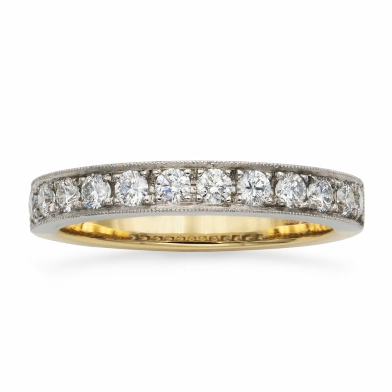 A Platinum And Yellow Gold Half-eternity Diamond Ring