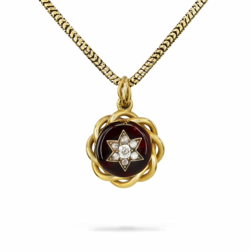 A Victorian garnet and diamond pendant