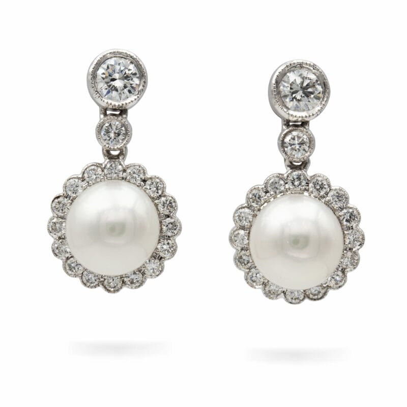 A Pair Of Cultured Pearl And Diamond Drop Earrings