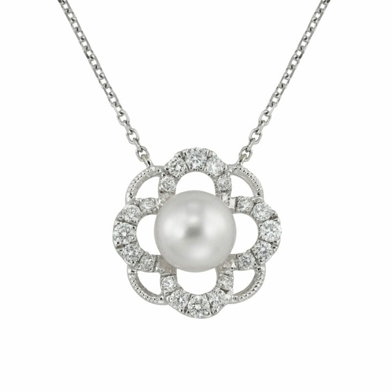 A Cultured Pearl And Diamond Flower Pendant