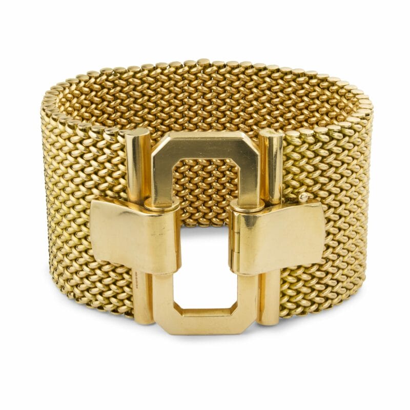 A wide yellow gold interwoven mesh bracelet