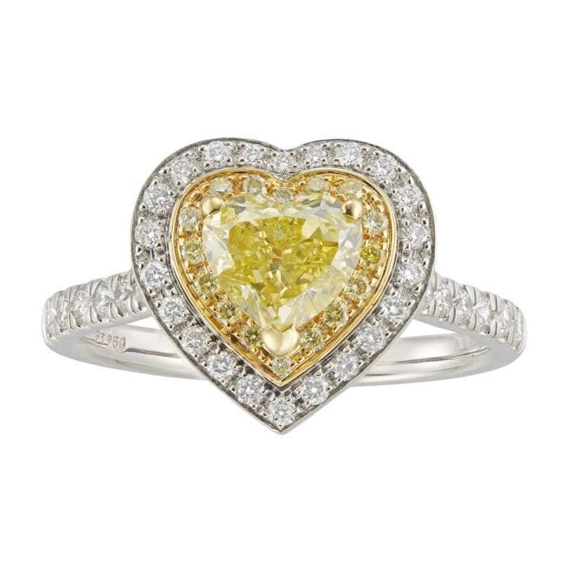 A heart-shaped yellow diamond cluster ring