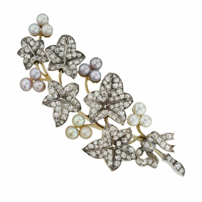 A Victorian natural pearl and diamond ivy spray brooch