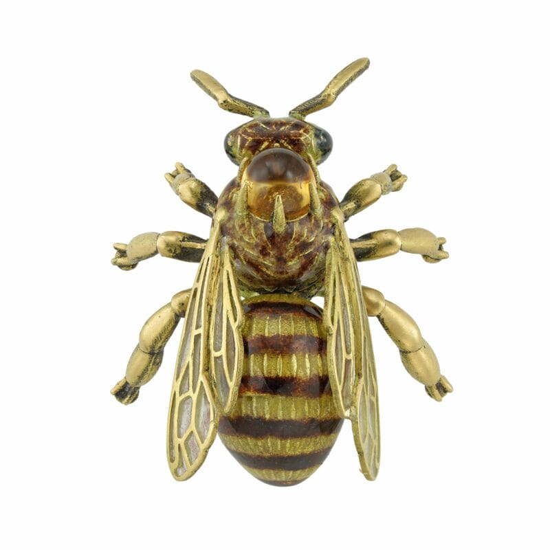 A yellow gold and enamel bee brooch