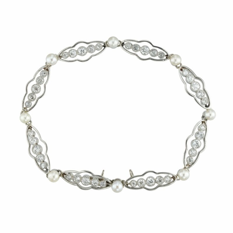 A French Art Deco diamond and natural pearl bracelet