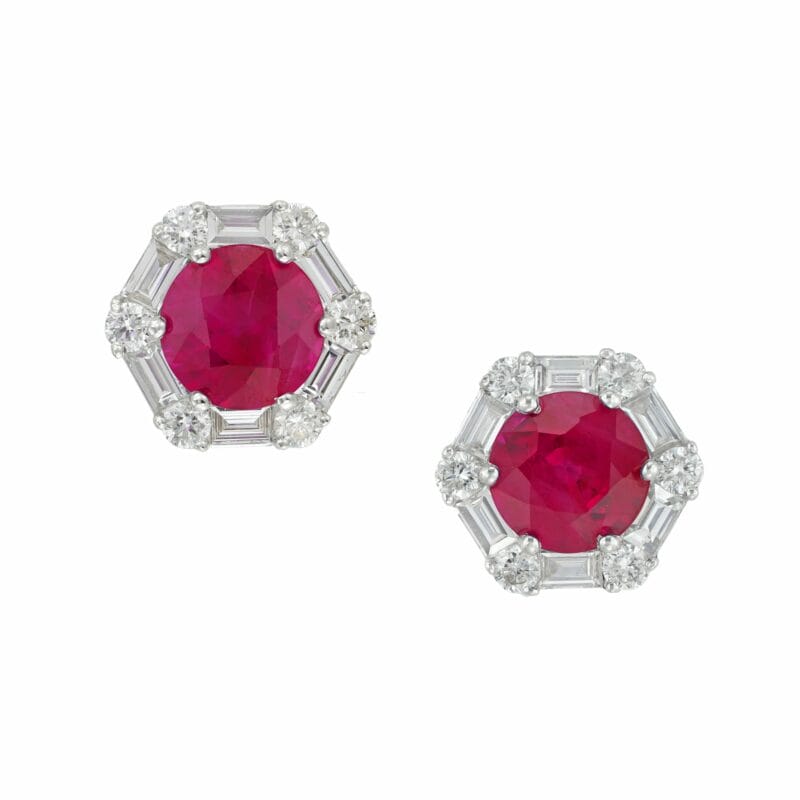 A pair of ruby and diamond hexagonal cluster earrings