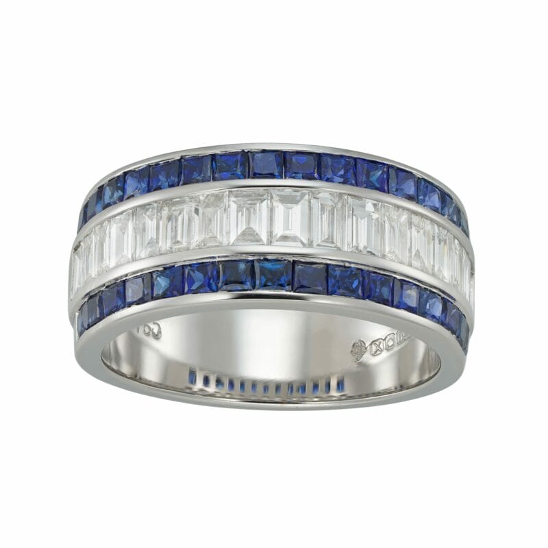A diamond and sapphire wide ring