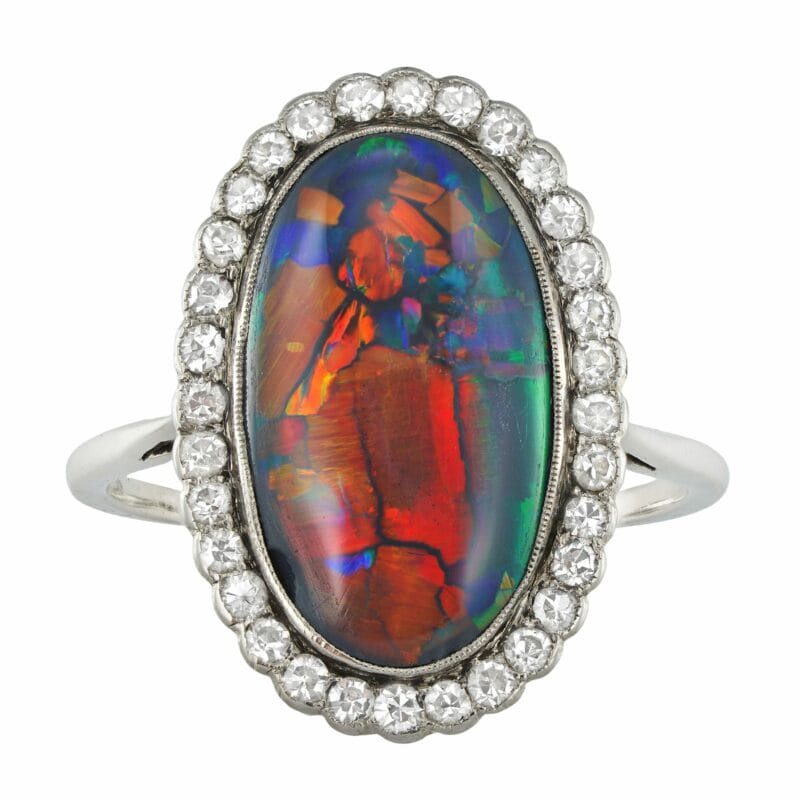 An Edwardian opal and diamond cluster ring