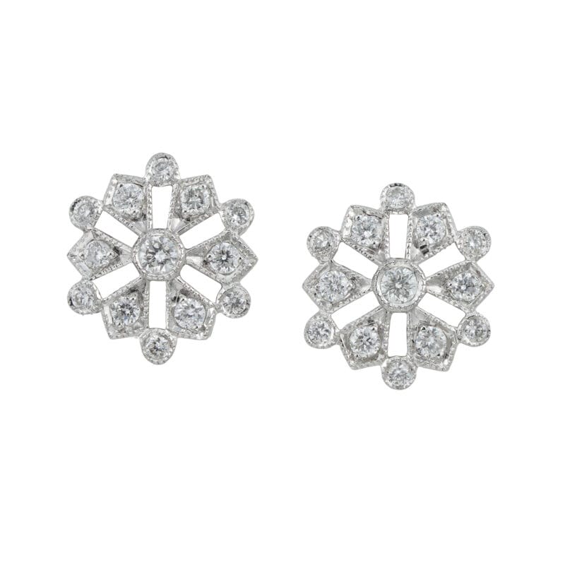 A pair of snowflake diamond cluster earrings