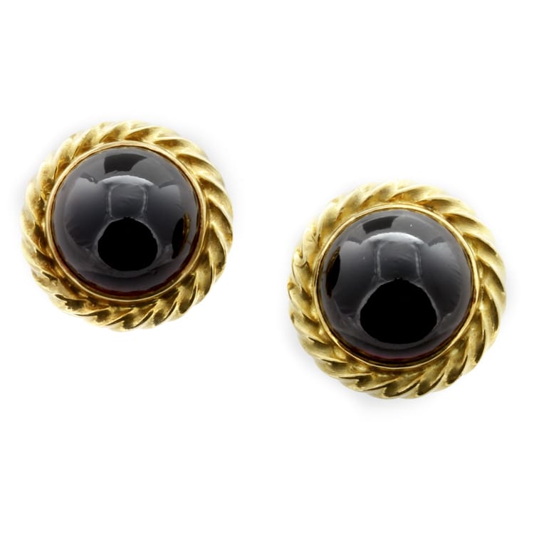 A pair of garnet and gold earrings