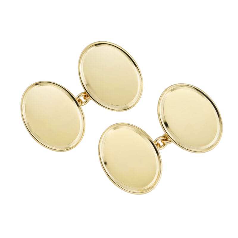 A pair of oval gold cufflinks