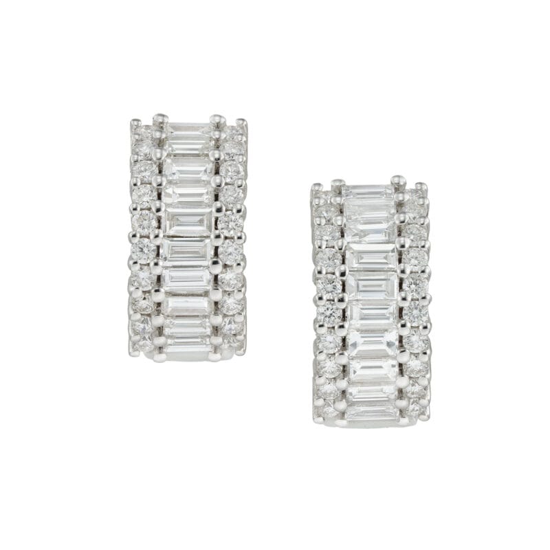 A pair of diamond-set huggie earrings