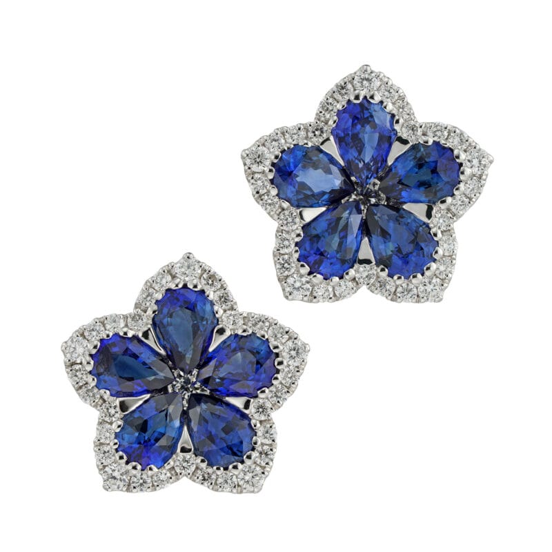 A pair of sapphire and diamond flower cluster earrings