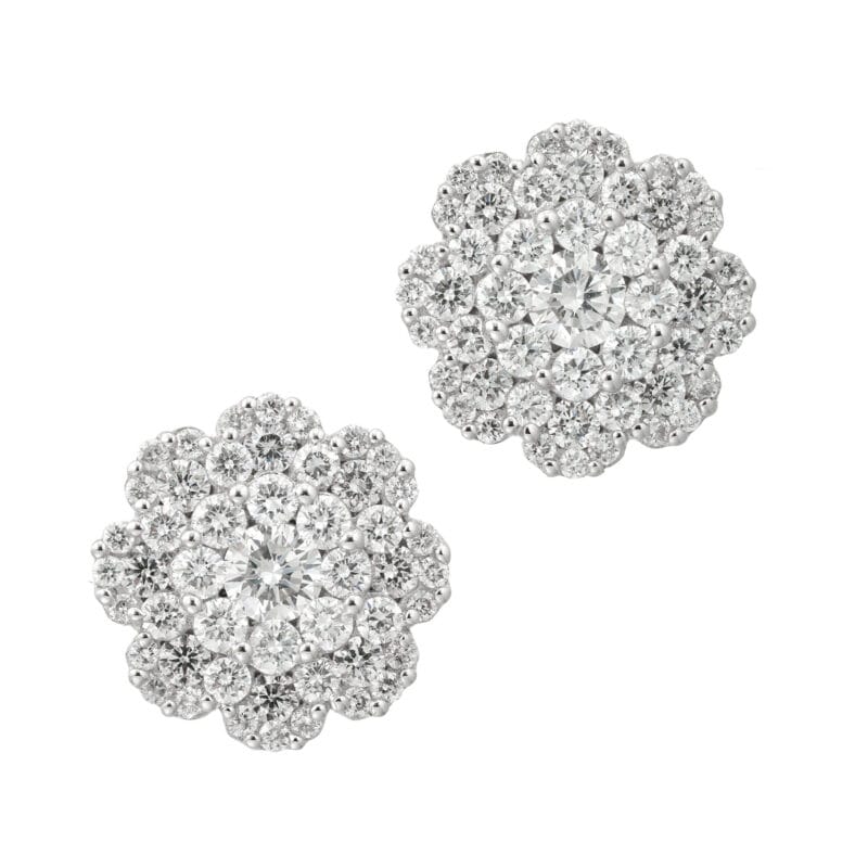 A pair of large diamond-set cluster earrings