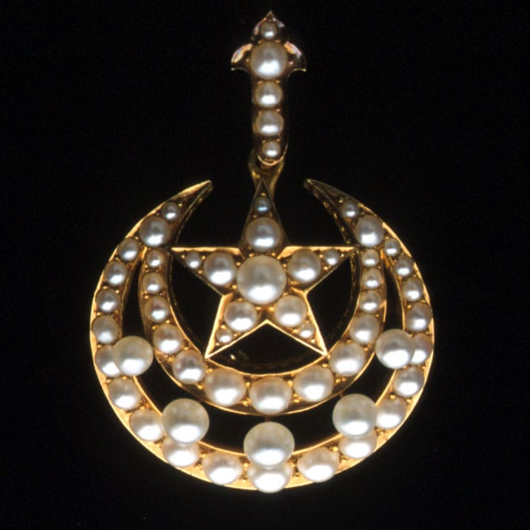 A Victorian Pearl And Yellow Gold Crescent Brooch
