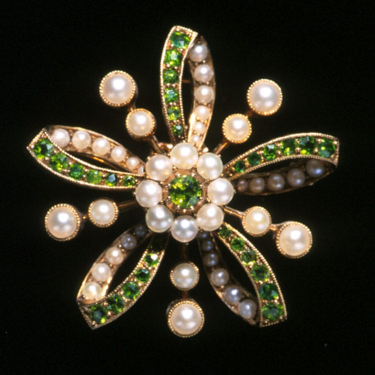 A Victorian Demantoid Garnet And Pearl Flower Brooch
