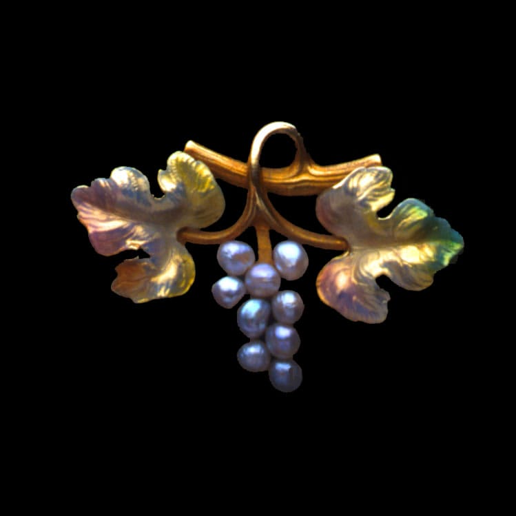 A Turn-of-the-century Enamel And Pearl Vine Motif Brooch