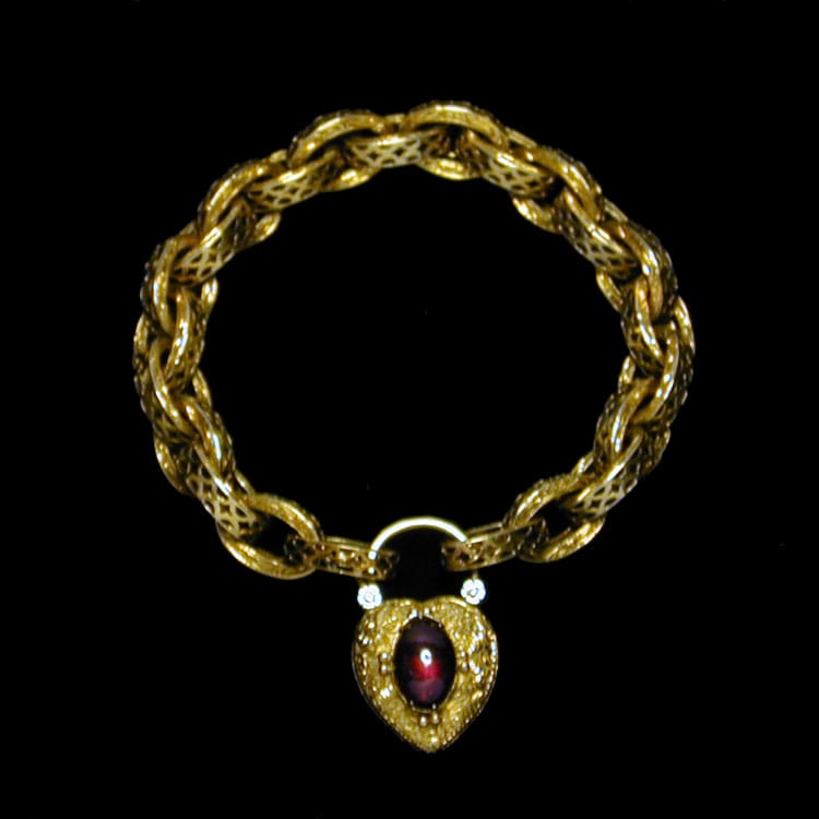 A Victorian Gold Bracelet With Garnet-set Heart Shaped Clasp