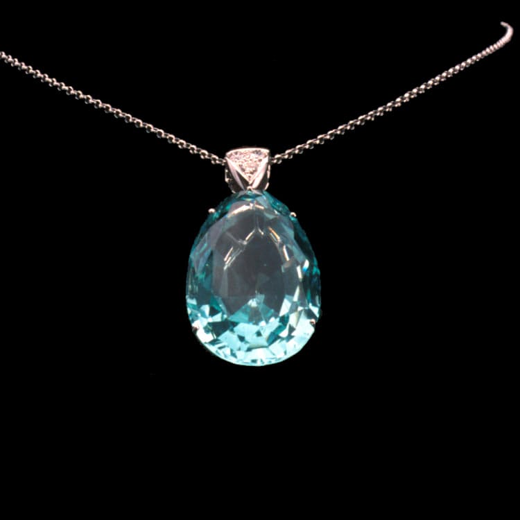 A Pear-shaped Aquamarine And Diamond Pendant