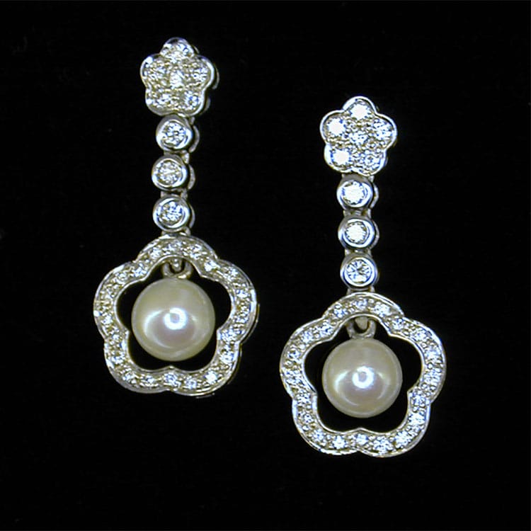 A Pair Of Cultured Pearl And Diamond Floral Drop Earrings
