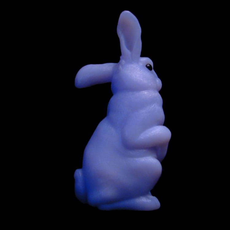 A Blue Chalcedony Rabbit Figurine With Onyx Eyes