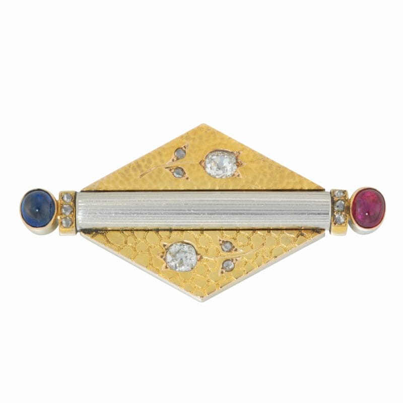 A Fabergé Ruby, Sapphire And Diamond Lozenge Shaped Brooch