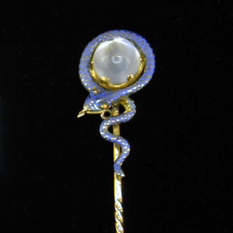 A Moonstone And Blue Enamel Serpent Stick Pin