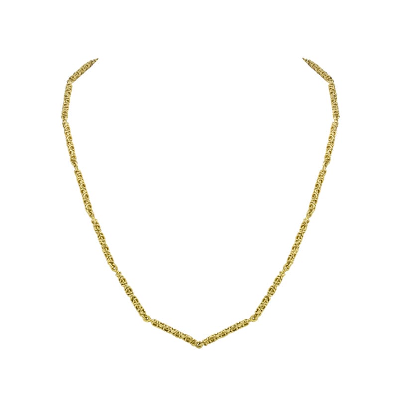 A yellow gold Zig-zag necklace, by Lucie Heskett-Brem