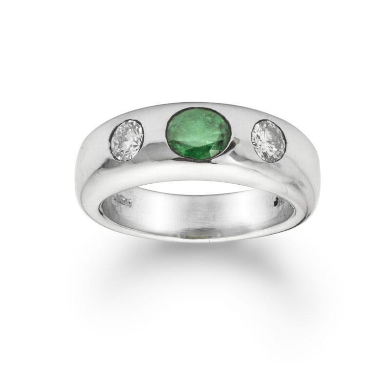 A Platinum Emerald And Diamond Gypsy Ring