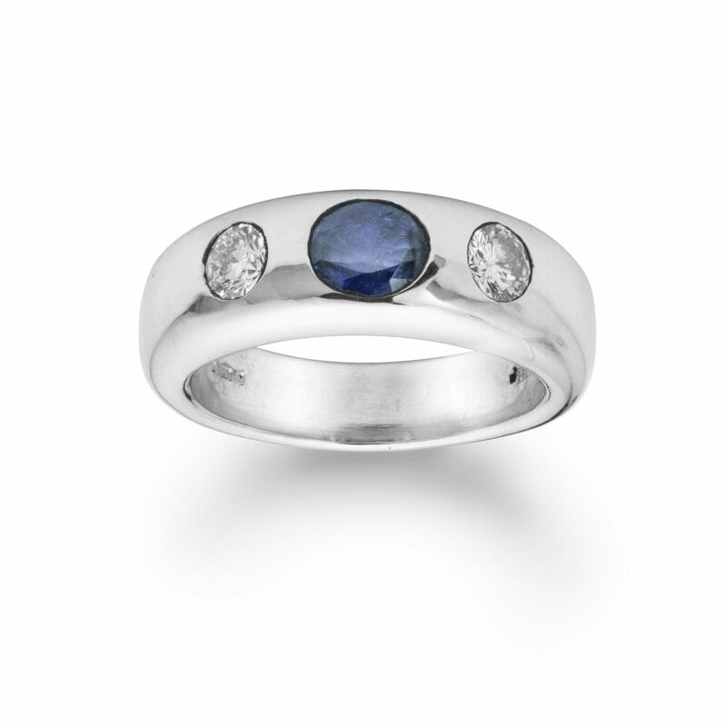 A Platinum Sapphire And Diamond Gypsy Ring