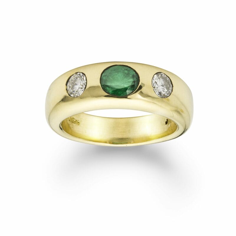 An Emerald And Diamond Gold Gypsy Ring