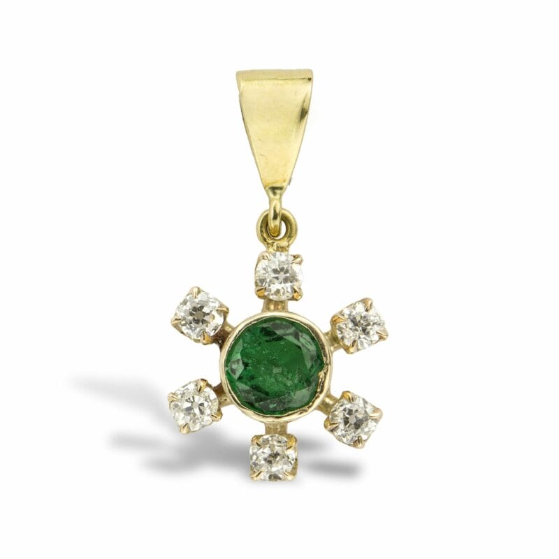 An Emerald And Diamond Cluster Pendant