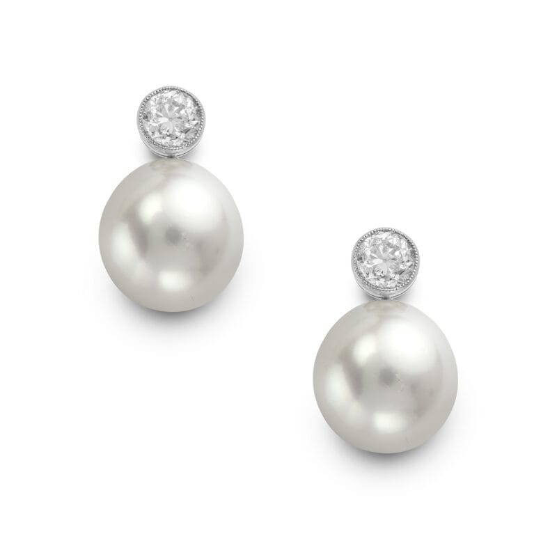 A Pair Of South Sea Cultured And Diamond Drop Earrings