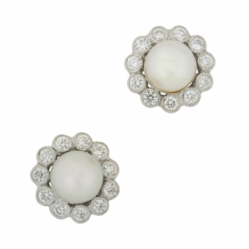 A Pair Of Natural Pearl And Diamond Cluster Earrings