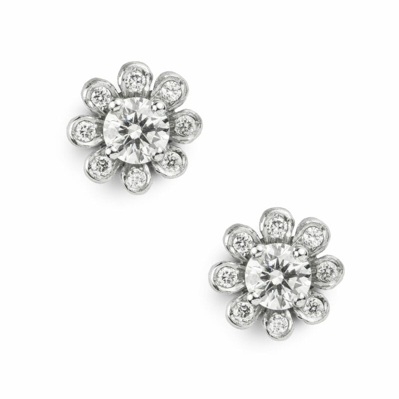 A Pair Of Small Flower-head Diamond Earrings
