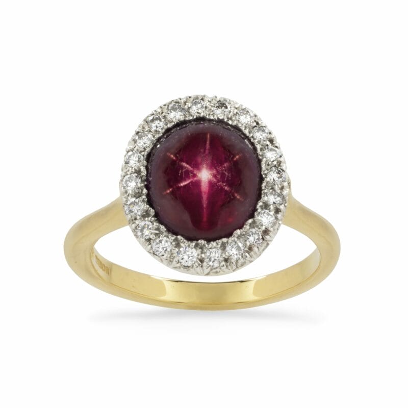 A Burmese Star Ruby And Diamond Cluster Ring