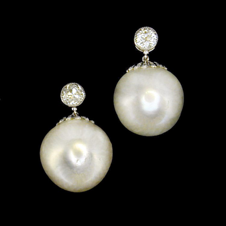A Pair Of Cultured South Sea Pearl And Diamond Earrings
